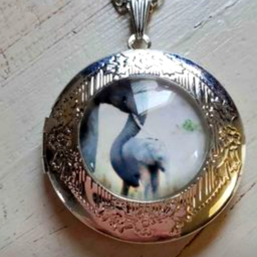 Elephant locket necklace.Pls see my store for other elephant jewelry pocket watc